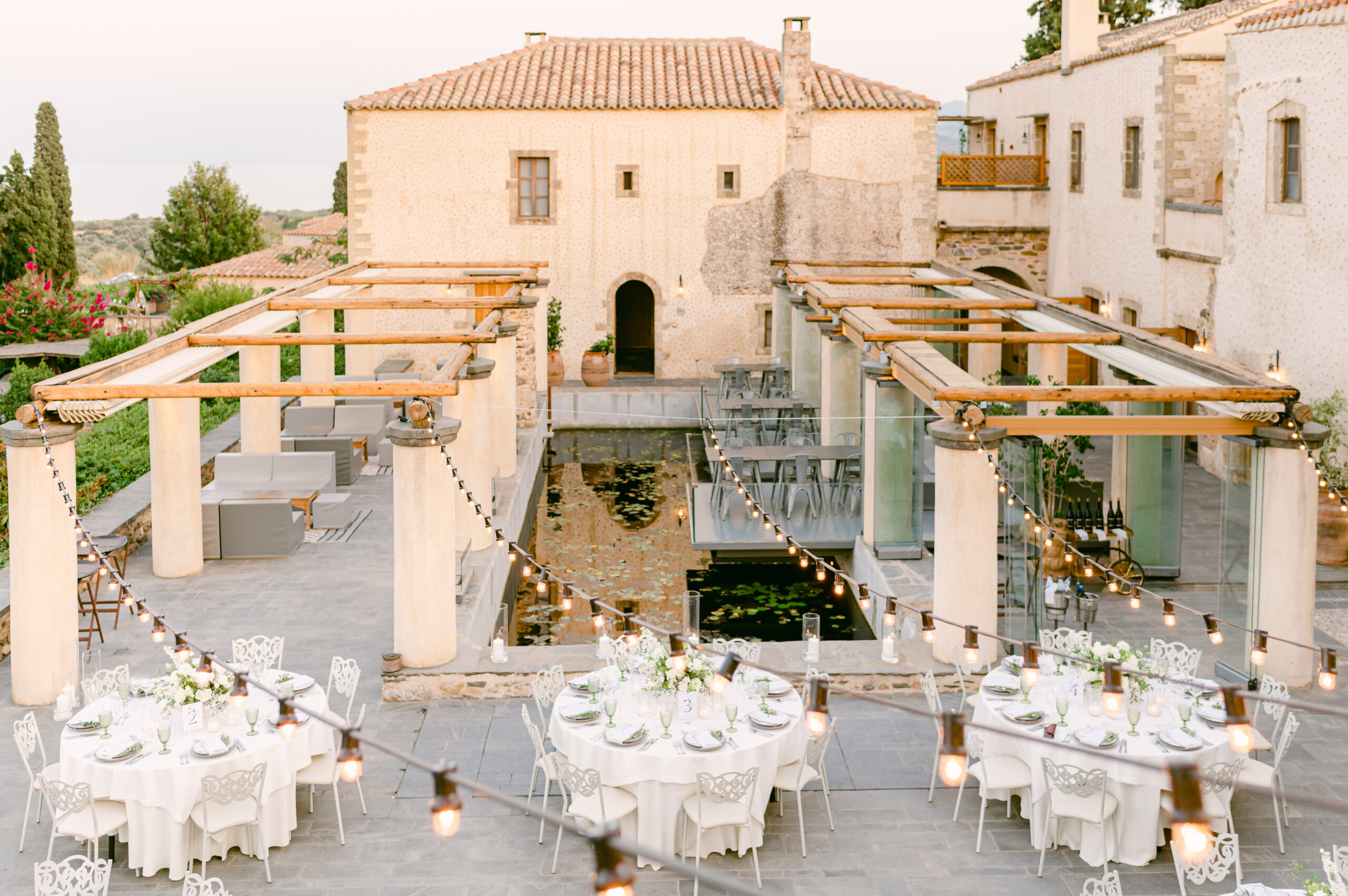 The scene is set at Kinsterna Hotel, for a fairytale wedding in Monemvasia